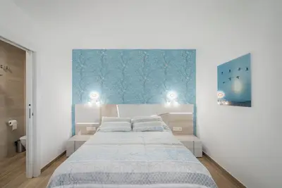 Image de Chambre '105 Matrimonio Blue' avec jardin partagé, Wi-Fi et climatisation