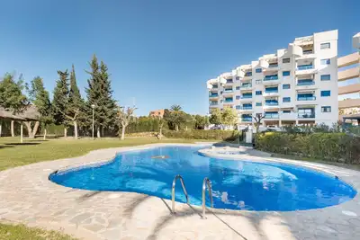 Image de Appartement 'White and Blue Village' avec vue sur la mer, piscine partagée et climatisation