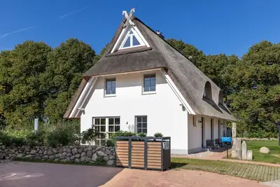 Image de Thatched house Xl with 5 bedrooms, fireplace and sauna - Dünenrose and Tuttelduuv