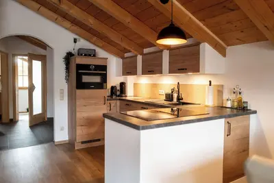 Image de Achentaler Alpentor 54 m² for 2-4 persons, eat-in kitchen, bedroom, shower/Wc, balcony, Wlan