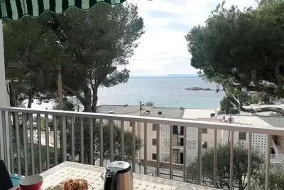 Image de Apartamento con Terraza y Vistas al Mar A 1 min de la Playa de Almadrava