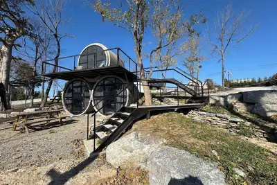 Image de Our Tubes offer a camping experience for those that love the outdoors but also love a bed.