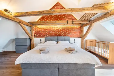 Image de Maison de vacances 'Feriehaus1856de avec sauna', jardin commun et Wi-Fi