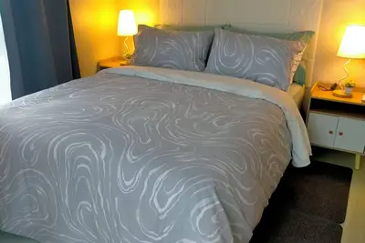 Image de Sunset Suite Avida \nA cozy 1-bedroom with Ac and WiFi in charming Iloilo City