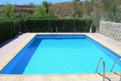 Maison de campagne 'Cortijo El Paso' avec vue sur les montagnes, piscine privée et terrasse privée