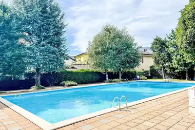 Image de Joli appartement pour 5 personnes avec piscine, Wifi, Tv, patio, animaux admis et parking