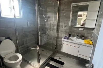Image de The cozy apartment is a 2 bedroom apartment with WiFi with the feeling of home.