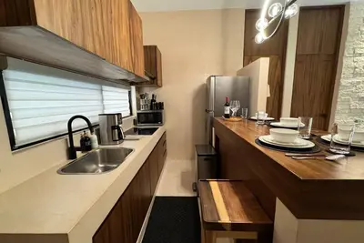 Image de Ideal apartment to relax, completely private garden and pool area.