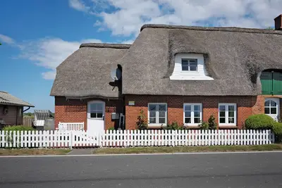 Image de Maison de vacances 'Ferienhaus Pellworm Findling' avec terrasse partagée, jardin partagé et Wi-Fi
