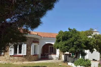Image de Villa Maucci dans le Villaggio Piras à 10 minutes à pieds de la plage.