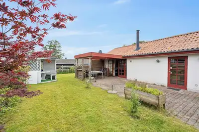 Image de Holiday home exuding coziness and comfort.