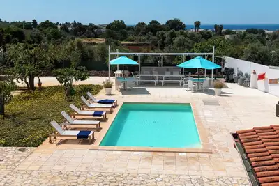 Image de Villa Rilù is a beautiful vacation home ideal for those seeking relaxation and comfort.