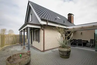 Image de Maison de vacances 'Ferienhaus Martje' avec terrasse privée, jardin privé et Wi-Fi