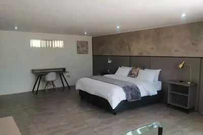 Room 1 of 8 Cozy Suites at The Hilltop Guesthouse
