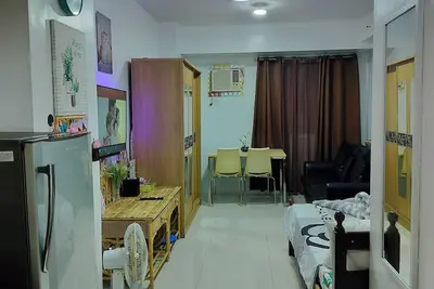 Image de Cozy condo in fantastic Quezon City with WiFi, Ac