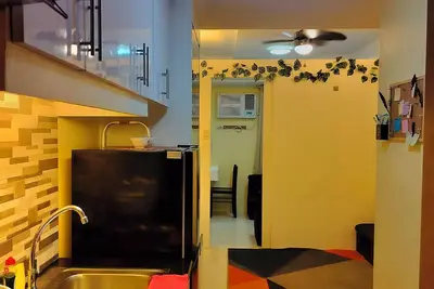 Image de Cozy 1-bedroom condo in lovely Quezon City with Ac