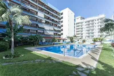 Image de Appartement de vacances 'Paraíso Playa Jardín' avec vue sur la montagne, piscine partagée et Wi-Fi