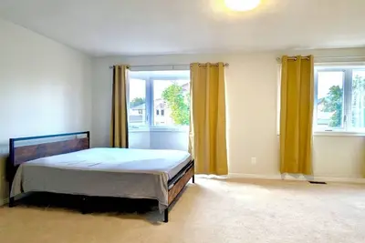 Image de Ensuite 10min from airport 15min to downtown