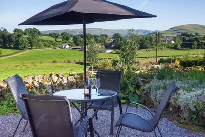 Image de Charming Lake District cottage with beautiful views, parking & Ev charger.