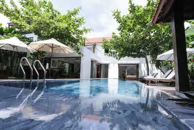 Banyan Ocean Villa is a large peaceful home just steps from the stunning Beach