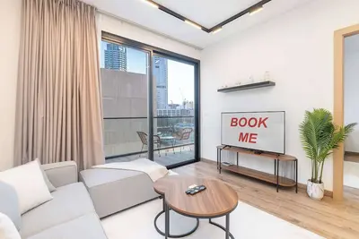 Image de StayShort - Stylish, Minimalist 2-Bedroom in Jumeirah Village Circle