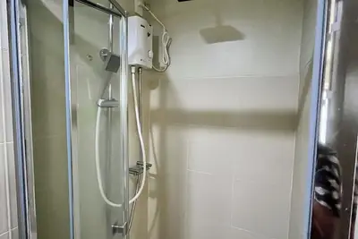 Image de 1-bedroom condo Near Shaw Mrt with Ac, WiFi, Balcony, Pool in Edsa Mandaluyong