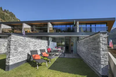 Appartement avec jardin et accès au sauna