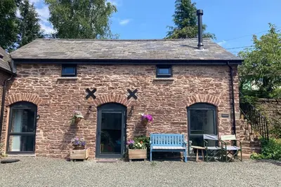Image de Cosy 2 bed barn in Bannau Brycheiniog national park, with outdoor patio.