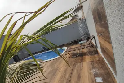 Image de High standard house in an upscale neighborhood of Caldas Novas with heated pool and games room