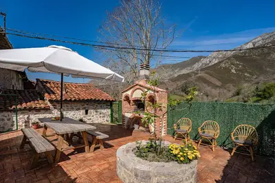 Image de Appartement 'La Breval' avec vue sur montagne, terrasse privée et jardin privé