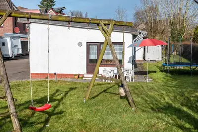 Image de Maison de vacances 'Haus Lahrsen' avec terrasse privée, jardin partagé et Wi-Fi
