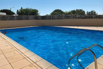 Image de Maison de vacances 'Résidence Clos De Tamaris' avec piscine partagée, terrasse et climatisation