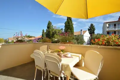 Apartment Orhideja 2  in Mali Lošinj, the nearest beach Zagazinjine is 500 m away.