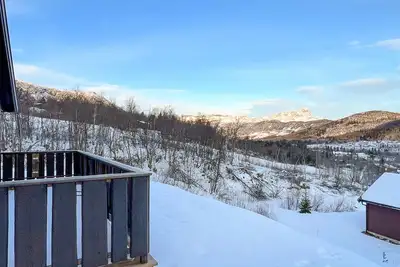 Image de Moderne hytte midt i skibakken