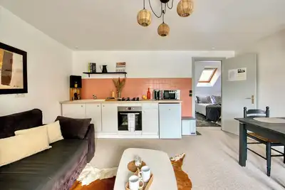 Image de Le Charmant, appartement chaleureux en centre ville, au calme- chambre séparée