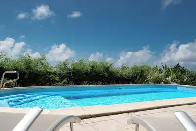 Image de Villa Coco Cosy un cocon tropical avec aperçu mer, parfait pour 4 personnes.