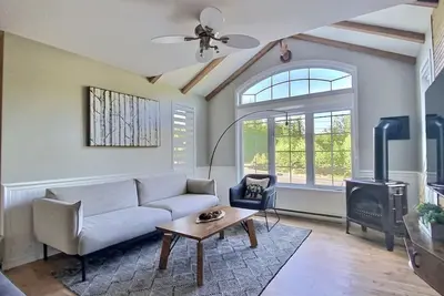 Image de Hôtel à la maison - Chalet Multi-Bois avec spa