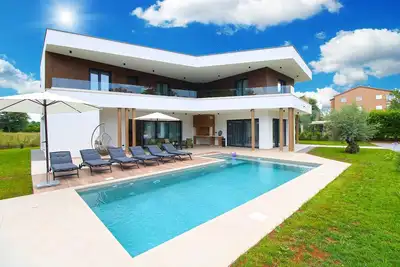 Image de Maison de vacances avec climatisation et piscine