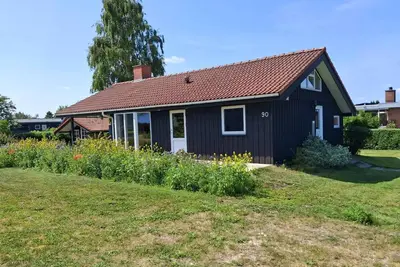 Image de Cozy summer house by the beach and forest.