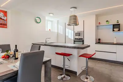Image de Bel appartement pour 4 personnes avec Wifi, bain Ă remous, Tv, terrasse et parking