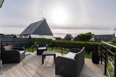 Image de Maison de vacances 'Maison Guidel Plage' avec vue sur la mer, terrasse privée et Wi-Fi