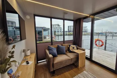 Image de Houseboat Fjord Cumulus with bio sauna and roof terrace in Wendtorf/ Kiel Fjord