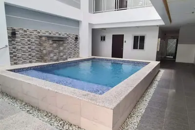 Image de CozyNest: Elegant Smart Studio Unit 104\n\n