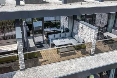 Appartement moderne avec balcon et accès au sauna