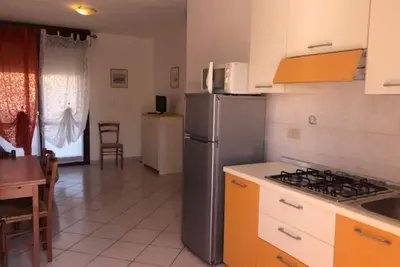 Image de Appartement confortable à Rosolina avec piscine partagée