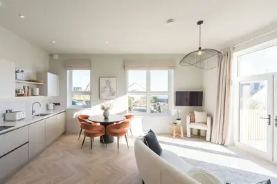 Image de A luxury ground-floor apartment, offering stunning coastal views for up to 4 guests
