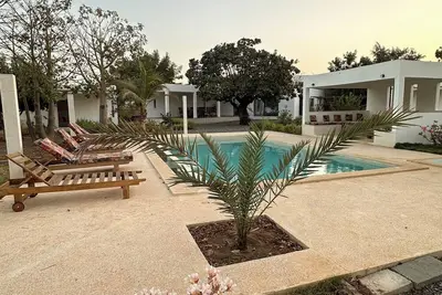 Image de Villa Maddy 14 couchages en résidence privée. 5 suites en bungalow indépendant.