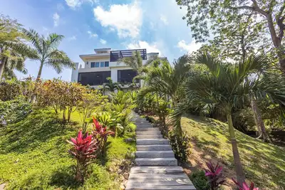 Image de 4br 3ba Beach view house in Sandy Bay with pool - Private community