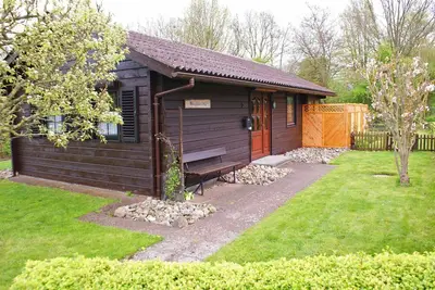 Image de Log cabin with W-Lan, fence and close to the beach - - with conservatory and new kitchen