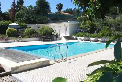 Image de Homerez - Maison cosy avec piscine à Vandoma